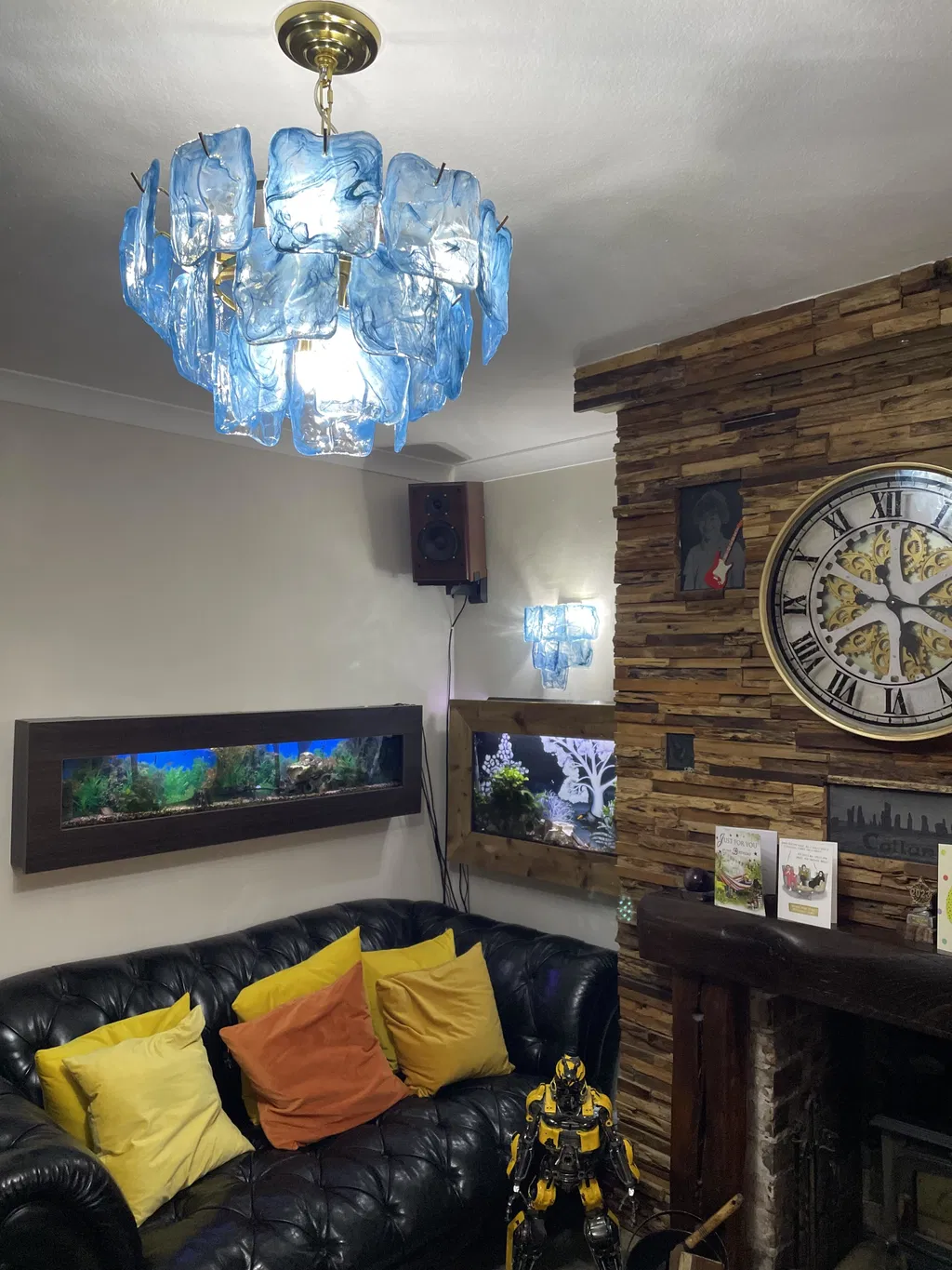 Blue Aureate Cascade Murano-style glass chandelier installed in a living room